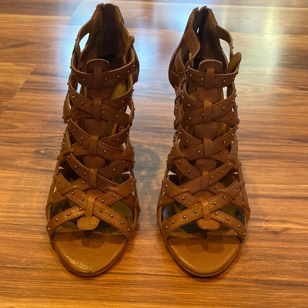 Slightly worn Nine West size 6.5 high heel gladiator in color brown